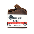 bar of soap named fireside chat with a mostly white label on a white background